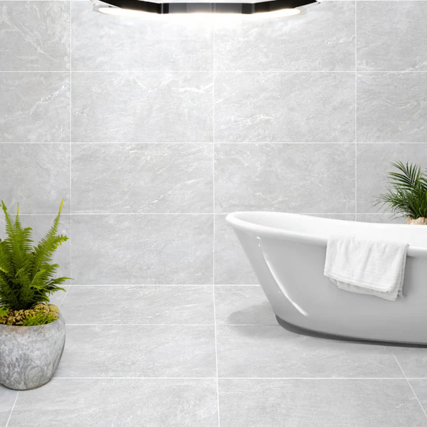 Flexstone Light Grey porcelain tile on bathroom walls and floor, with a subtle marble-look or natural stone-effect finish.