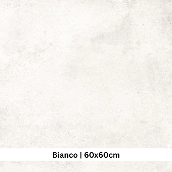 Luxor Bianco (White) porcelain tile with a soft concrete-look finish, ideal for walls and floors. Size: 60x60cm.