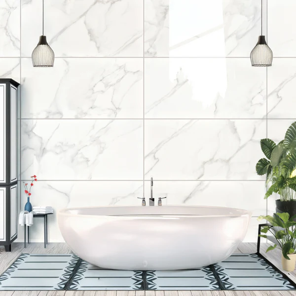Luxurious bathroom wall with glossy Steady Marble Sugar Wall Tile, featuring white marble and subtle grey veining, above a freestanding tub.