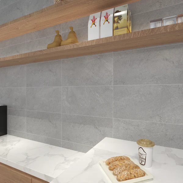 Grey Texas Wall & Floor Tile with a subtle concrete-look finish used as a kitchen backsplash above a white marble counter.