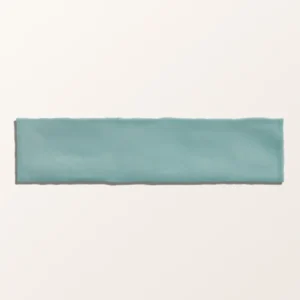 Carter Mint 7.5x30cm ceramic tiles with a handmade-look ripple texture and glossy, pale mint green finish in a close-up photo.