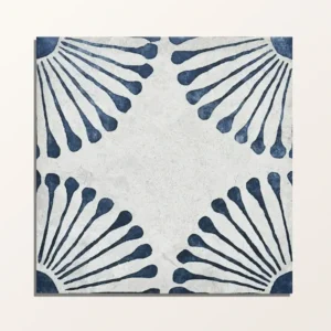 Cuba Porcelain Infantas Blue 20x20cm tile with a distressed light grey background and navy blue fan/sunburst pattern in all four corners, shown close up.