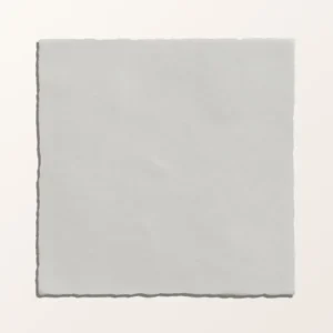 Maroc Porcelain Bianco 9.9x9.9cm tile with a distressed, faded off-white surface and subtle edge variation for a rustic, handmade look.