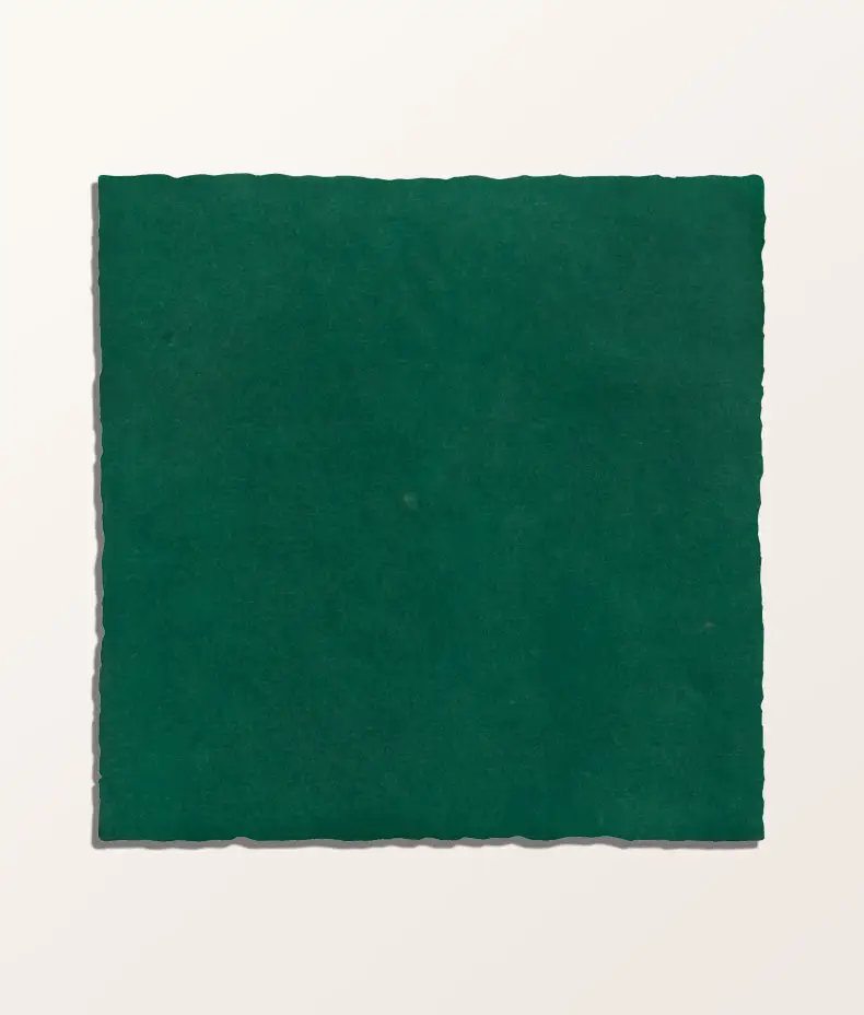 Maroc Porcelain Teal 9.9x9.9cm tiles covering a kitchen backsplash, showcasing the rustic, faded teal finish and subtle surface variation.