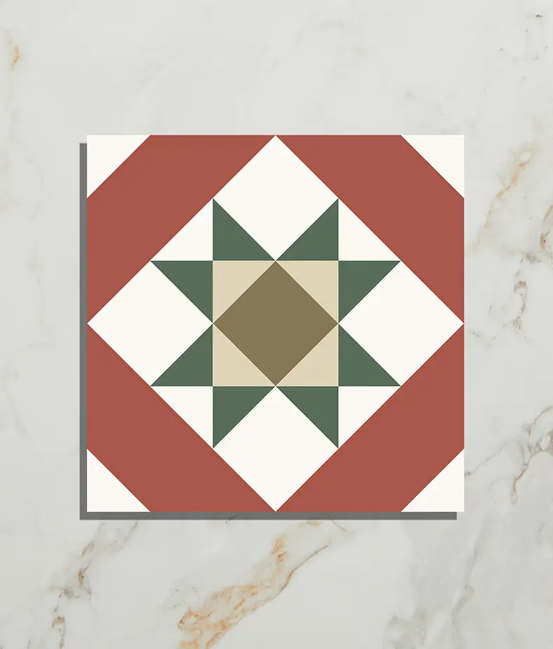 PORTARE Brompton Clarence 20x20cm tile with a red, white, green, and beige geometric star pattern on a white marble background, shown close-up.