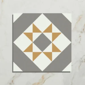 PORTARE Brompton Euston 20x20cm tile with a grey, white, and ochre geometric star pattern on a white marble background, shown close-up.