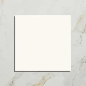 PORTARE Brompton Field Milk 20x20cm tile with a solid matte white/off-white color and shadow effect, displayed on a white marble background.