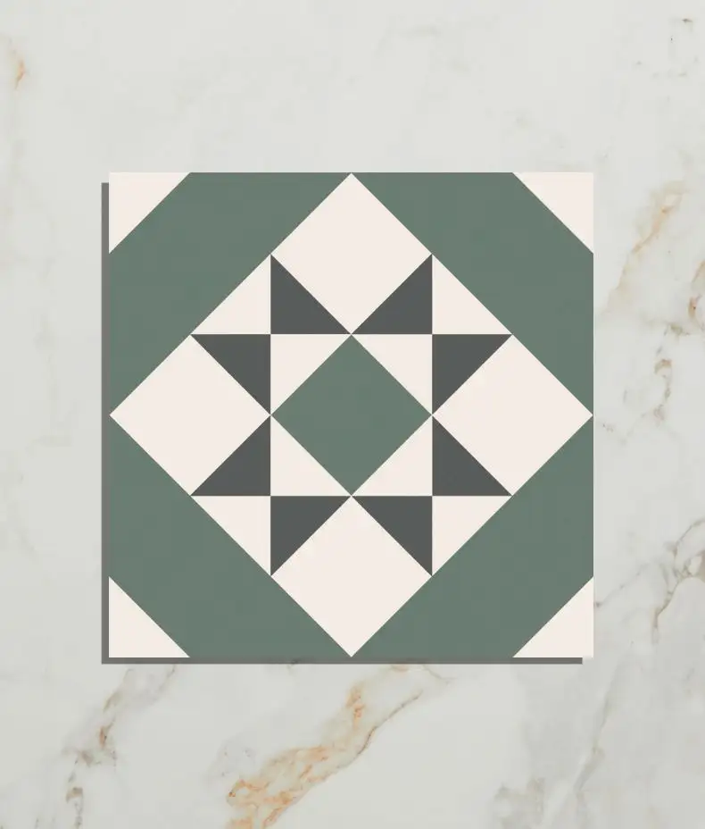 PORTARE Brompton Greenwich 20x20cm tile with a sage green, off-white, and charcoal geometric star pattern on a white marble background.