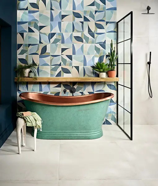 Rio Porcelain 22.5x22.5cm tile with a geometric blue, white, and gray pattern that creates a captivating optical illusion on the floor.