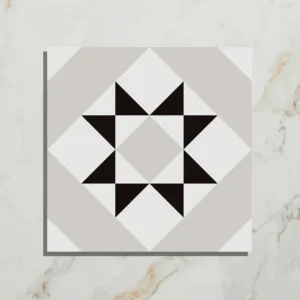 PORTARE Brompton Porcelain Borough 20x20cm tile with a monochrome eight-pointed star geometric pattern in white, light grey, and black on a marble background.